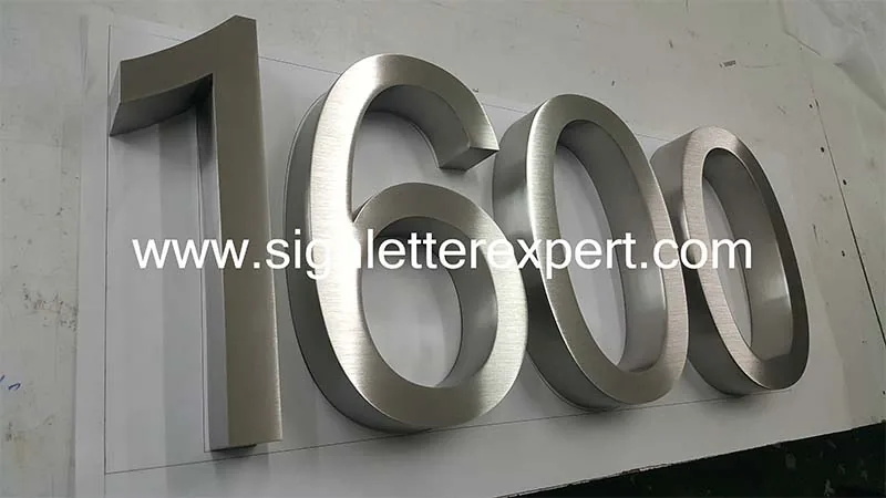 Brushed stainless steel sign numbers