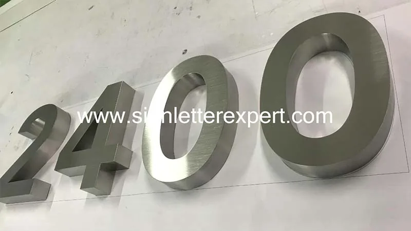 Brushed stainless steel sign numbers