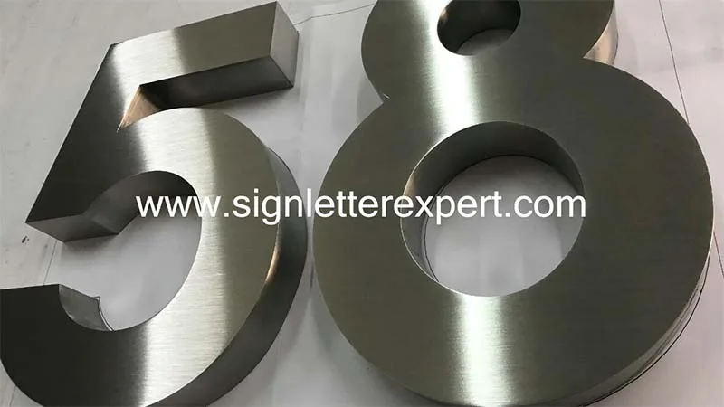 Brushed stainless steel sign numbers