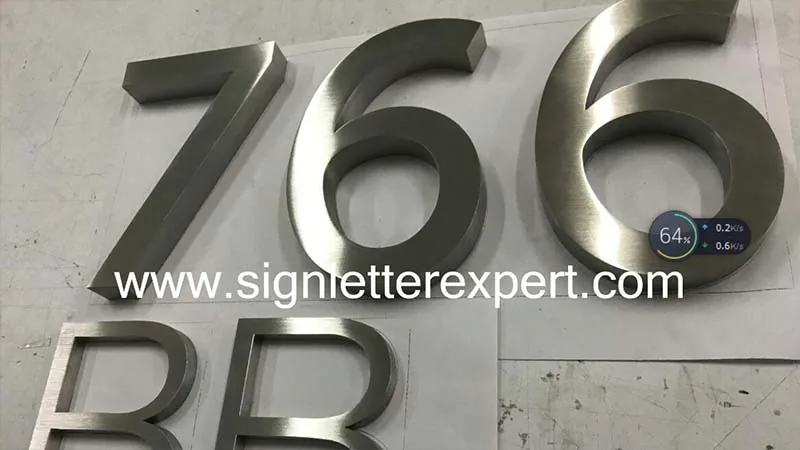 Brushed stainless steel sign numbers