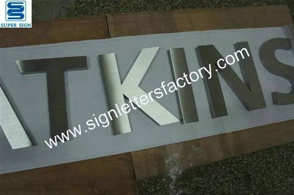 Brushed Stainless Steel Letter Signs 12 made by Super Sign