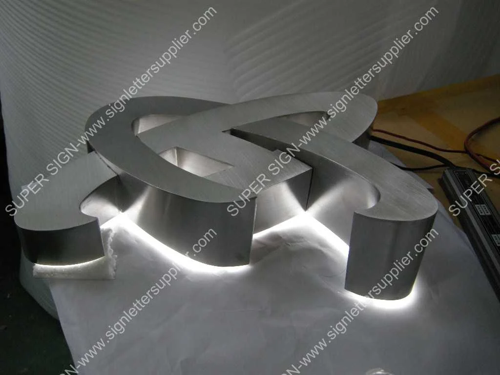 3D brushed stainless steel sign logo 04 — additional workshop photograph of the finished letter