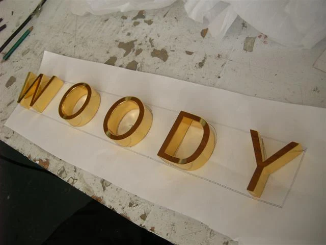 Golden polished stainless steel letters 17 — additional workshop photograph of the finished letter