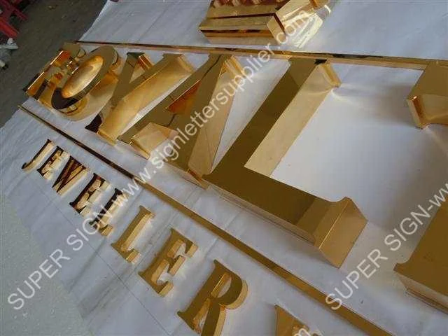golden polished steel letter 03 — additional workshop photograph of the finished letter