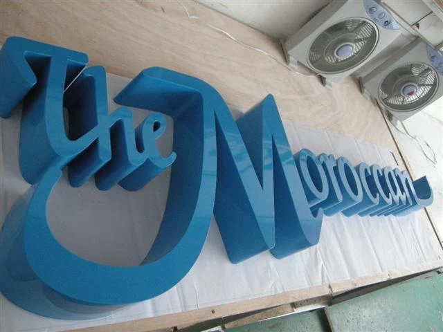 Painting stainless steel letters 24 — additional workshop photograph of the finished letter