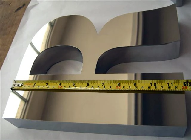 Polished stainless steel letters 21 — additional workshop photograph of the finished letter