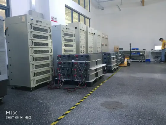 Engineer configuring a battery management system on a lithium pack