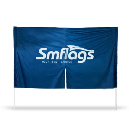 Breakaway banner mounted on poles at a high school football field entrance