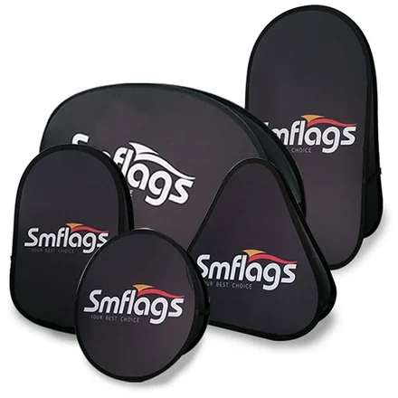 Pop Up A-Frame banner in round shape with ground stakes inserted into grass