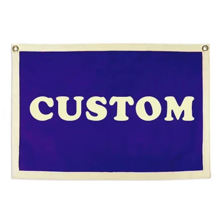Felt banner with felt header on the top side, hanging on a wall
