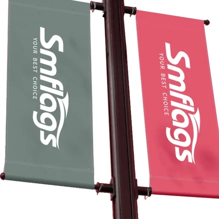Close-up of brass grommets and pole sleeves on a 30in x 60in avenue banner