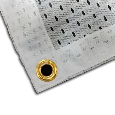 Close-up of the perforated mesh fabric structure on a banner