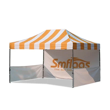 Tent being folded and packed into a wheeled bag for transport