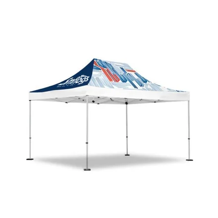 Tent with half wall and ground spikes secured on grass