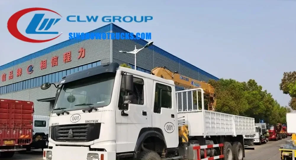 6WD Sinotruk HOWO double cabin all drive telescopic boom truck in Nigeria with crane extended and cargo box loaded