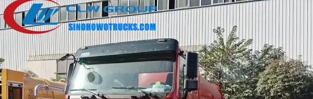 6x4 Sinotruk HOWO 336HP sewage suction truck in standard grey with rear tailgate fully open