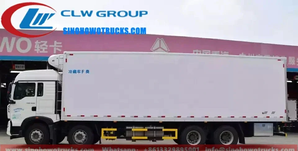 8x4 Sinotruk HOWO 30 ton vegetable and fruit frigo truck in white with refrigeration unit and polymer composite body