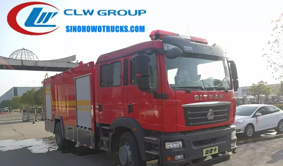 CNHTC 10 tons water and foam fire truck in fire service red with top-mounted monitor and rear folding ladder