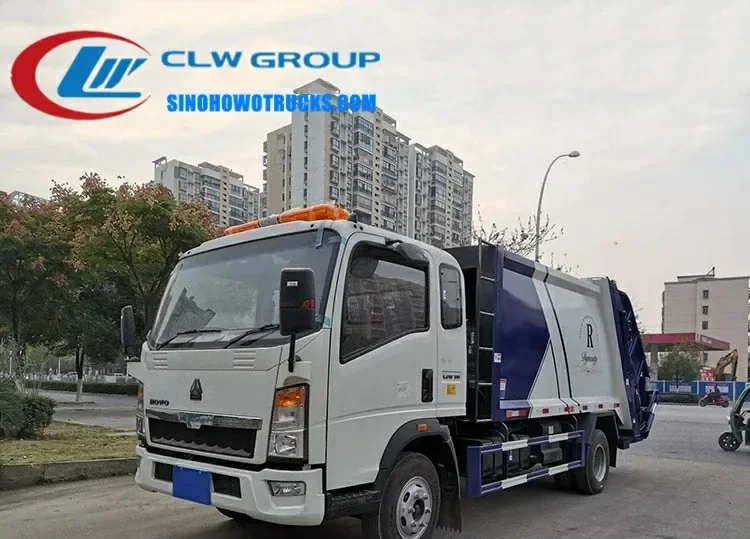 HOWO 10m3 refuse truck in white and green with custom logo on front doors and sides