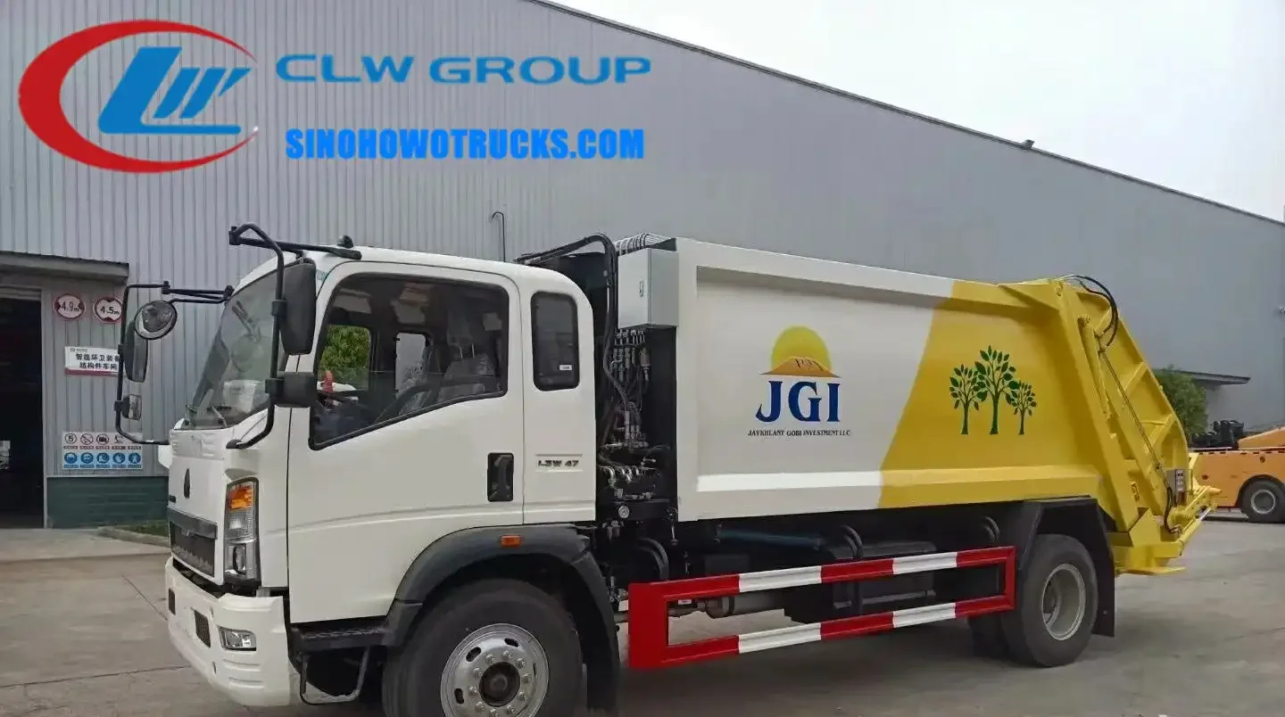 Sinotruk HOWO 4x2 rear loader waste truck with 5 cbm compactor body in metallic grey