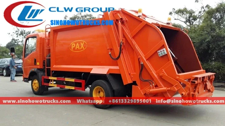 HOWO light duty trash truck in white with rear loader compaction system and 6 m³ body