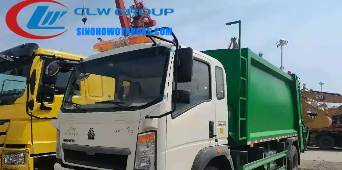 Sinotruk HOWO 8 ton compactor truck in urban waste collection service with hydraulic compaction body