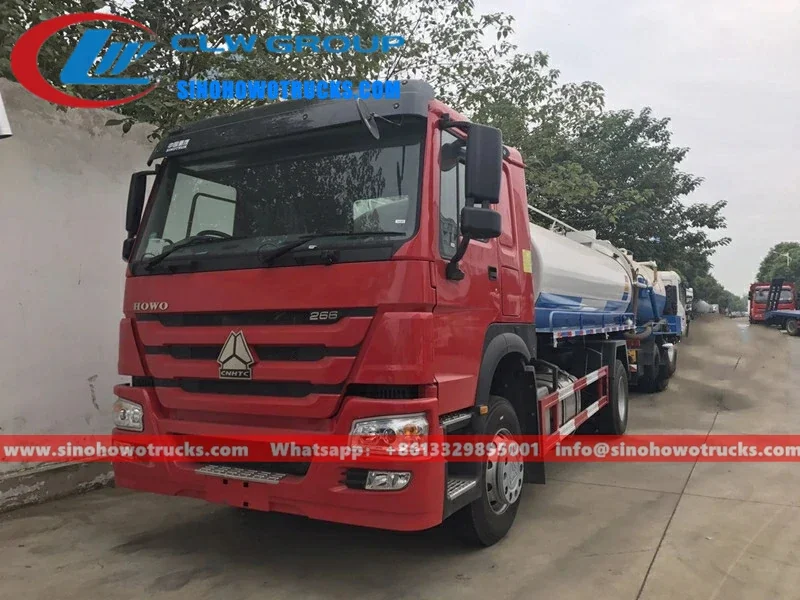 Sinotruk HOWO 12000 litre septic truck in service colour with front-mounted vacuum pump and suction pipe