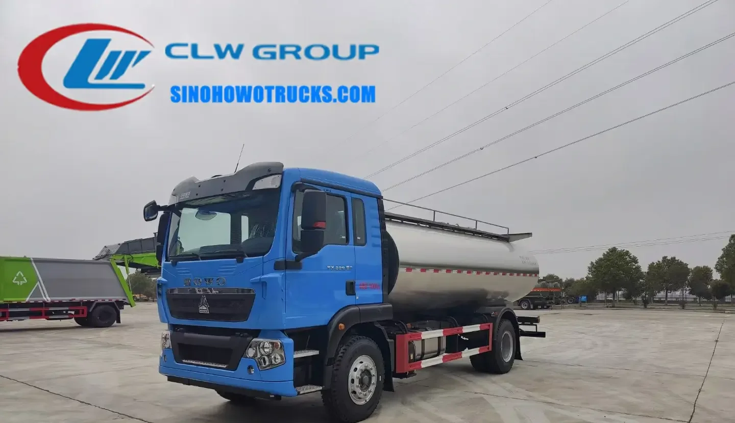 Sinotruk HOWO 4x2 dairy milk delivery truck in white with rear water cannon and front sprinklers