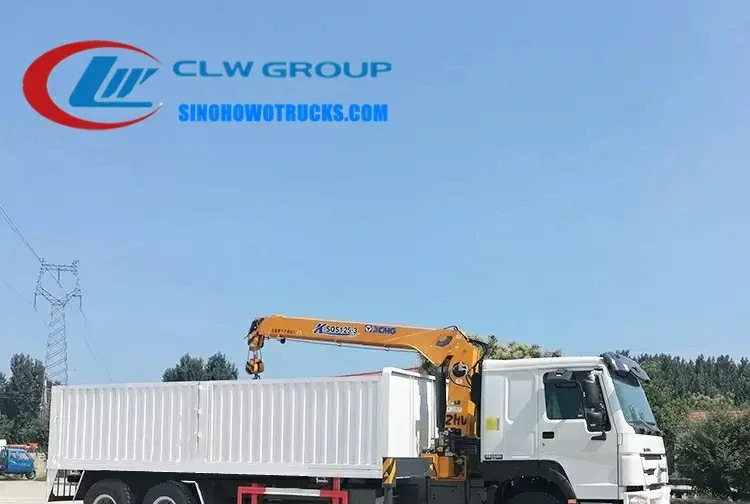 Sinotruk HOWO 15t service truck with crane in industrial grey with telescopic boom extended