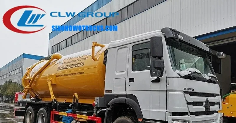 Sinotruk HOWO 16000 litre sewage water tanker in urban setting with rear tank cover open