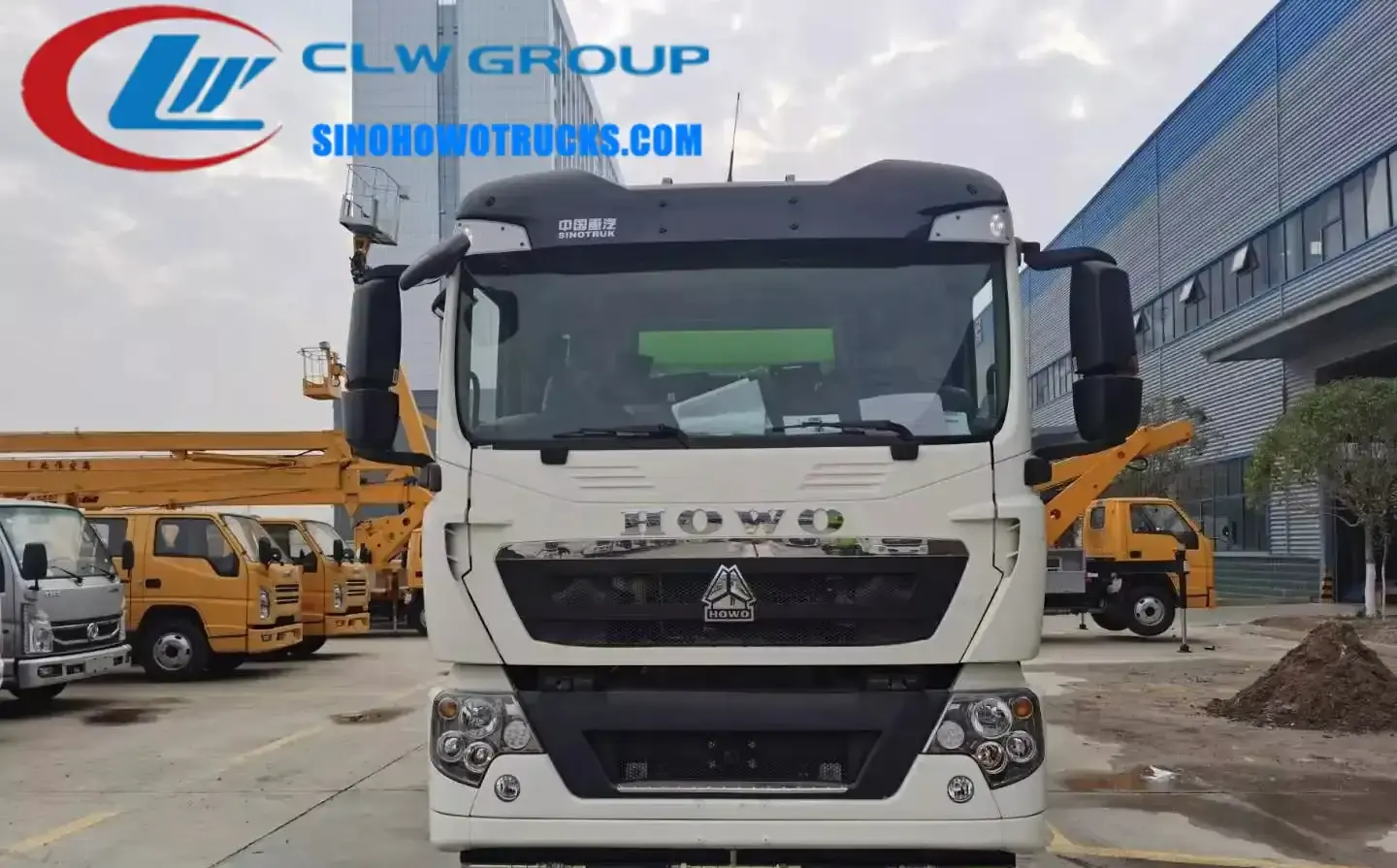 Sinotruk HOWO 16cbm truck mounted road sweeper in city service blue with front sprayers and side suction nozzles
