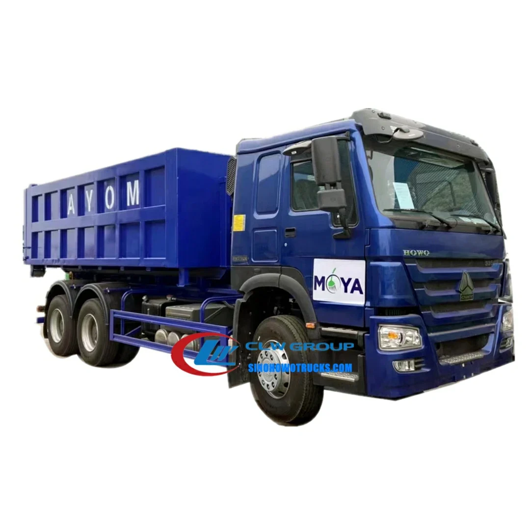 Sinotruk HOWO 6x4 rolling arm dumpster hook truck in urban waste collection service with hydraulic lift system engaged