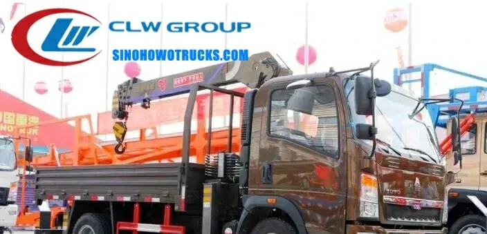 Sinotruk HOWO 3 ton small truck crane in Cote d’Ivoire with telescopic boom extended and cargo box loaded