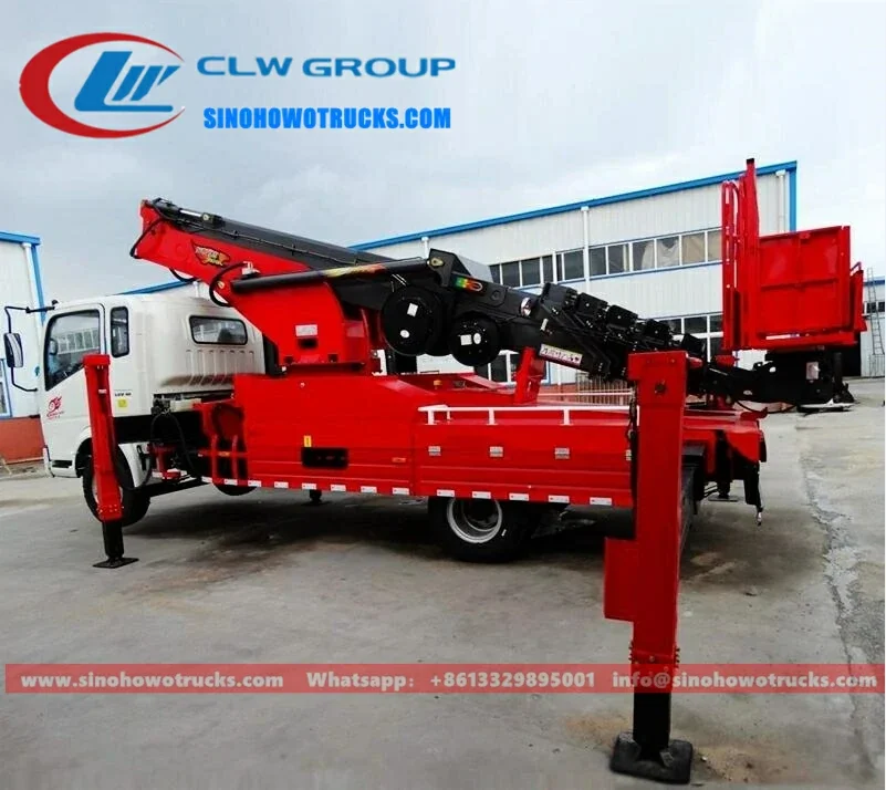 Sinotruk HOWO 30 meter telescopic boom lift truck in urban work environment with extended boom and insulated basket
