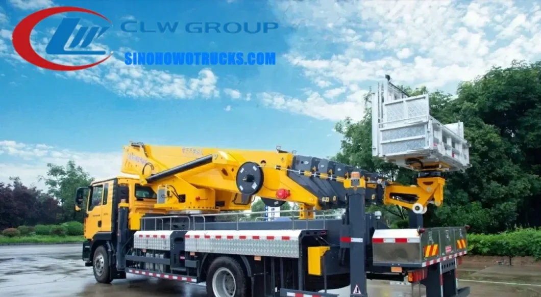 Sinotruk HOWO 45-50 meter aerial work platform truck in urban setting with extended arm and work basket at height