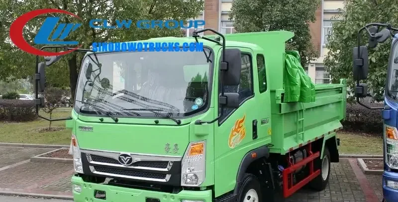 Sinotruk HOWO 6m3 commercial dump truck in red with middle tipping hydraulic system in a rural construction site