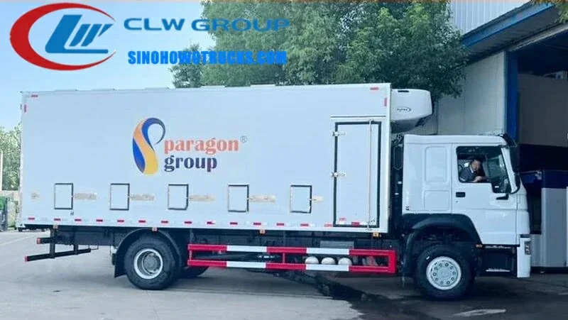 Side view of the HOWO chick transport vehicle showing ventilation and exhaust vents