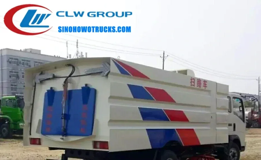 Sinotruk HOWO 7m3 truck mounted sweeper in metallic grey with front-mounted brooms and side-mounted dustbin
