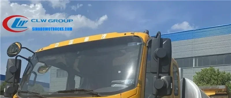 Sinotruk HOWO 8000 litre bitumen spreader truck in white with rear spray system and control panel