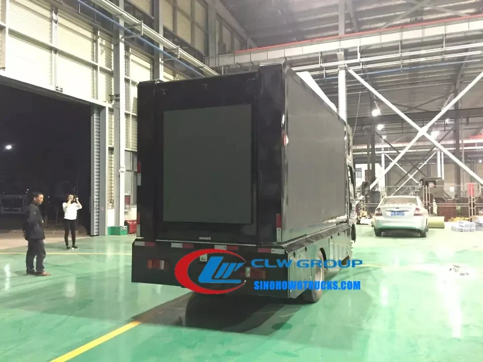 Sinotruk HOWO mobile LED billboard truck with two side screens lifted 1.5 metres for stage use