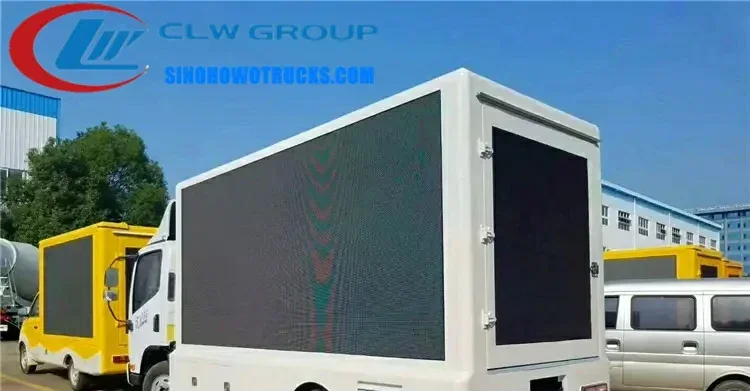Sinotruk HOWO P3-P6 LED screen truck in urban setting with side and rear screens active