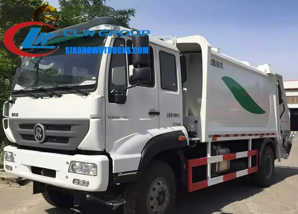 Sinotruk Steyr 12m3 garbage collection truck in urban waste collection service with arc-shaped compactor body and rear loading platform raised