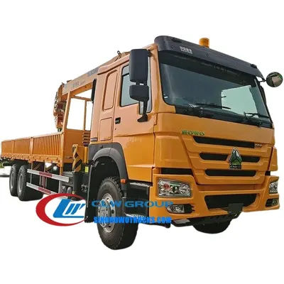 Rear view of the crane truck with the boom and slewing mechanism visible