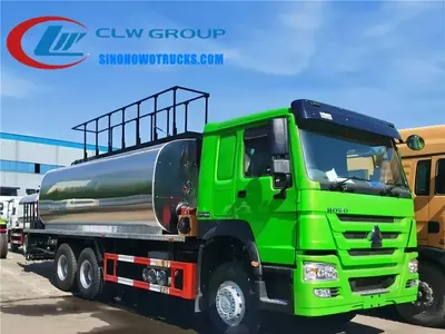 10 wheel Sinotruk HOWO 16 ton asphalt oil distributor truck in service on a road construction site in Vietnam