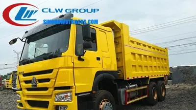 Side view of the HOWO 25cube dump truck showing the high strength steel tipper body and 12.00R20 tyres