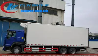 Front view of the HOWO reefer truck with refrigeration unit mounted on the front and cab control panel