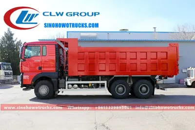 10 wheeler Sino SITRAK 20 ton dump truck in construction site with front lift hydraulic system raised
