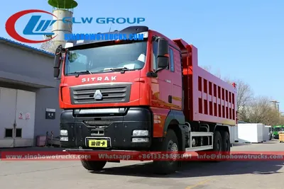 Rear view of the SITRAK dump truck with hydraulic pistons and dump box in full lift position