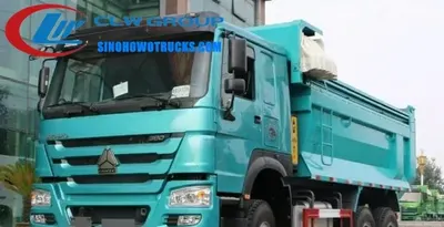 Rear view of the HOWO mining haul truck with hydraulic piston lifting the tipper body
