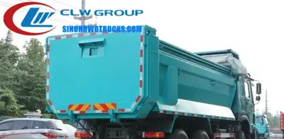Side view of the HOWO 30 ton dump truck showing high strength steel tipper body and 12.00R20 tires